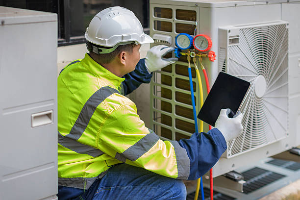 Professional Ac Installation technician working in Vallonia, IN